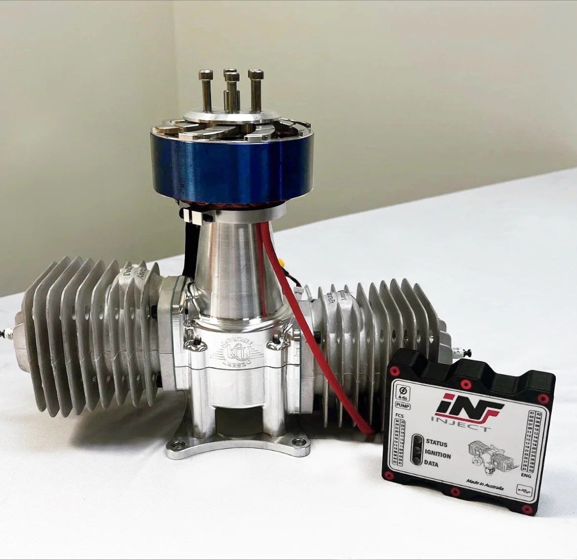 Image of Innoflight International's INF150 EFI UAV Engine with alternator and self starting ignition.