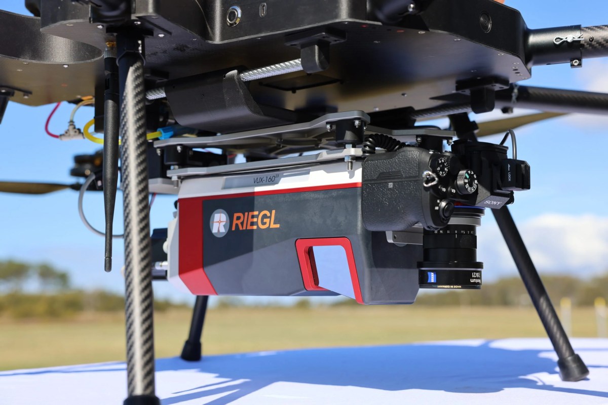 Close up image of Innoflight International's Heavy Lift and Long Endurance Hybrid ScanLift Orbit UAV carrying REIGL's Vux-160 LiDAR.